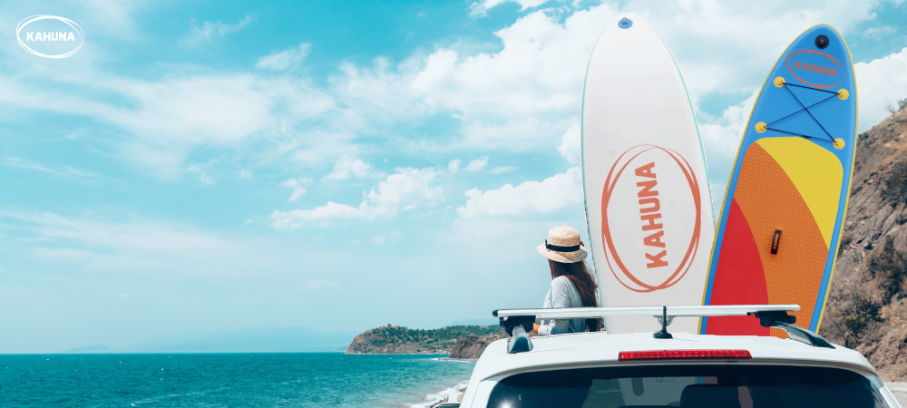 A woman on her way to a SUP trip with Kahuna Hana