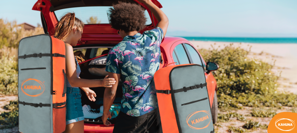 A couple with Kahuna SUP bags