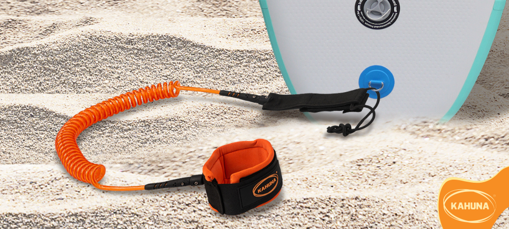 Kahuna coiled ankle leash attached to board