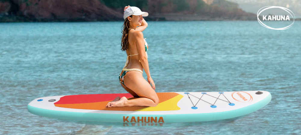 Young woman out SUPing on a lake