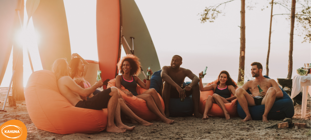 Chilling on a beach with friends after paddle boarding