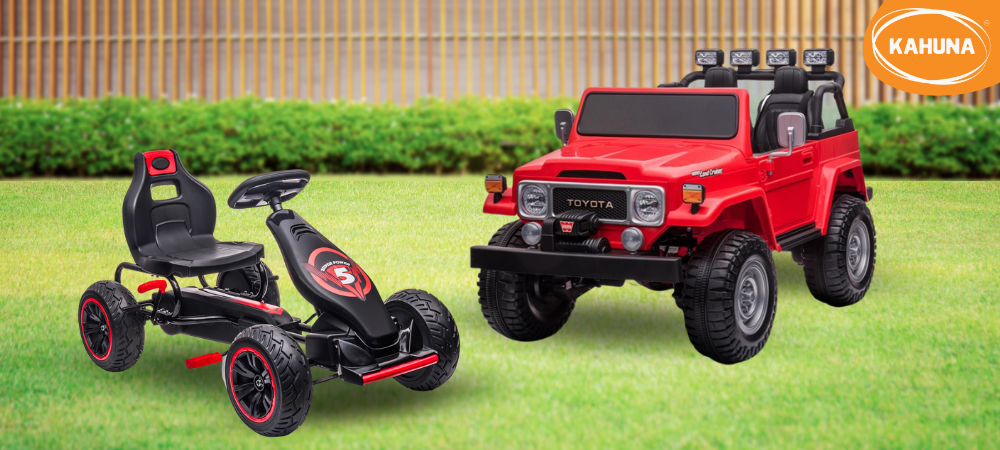 Red Kahuna go kart and licensed Toyota ride on car in a yard